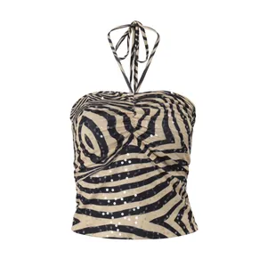 Close-up of zebra pattern halter top with silver sequins and pleated chest detail