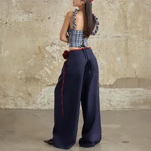 Detailed back view of stylish blue plaid corset top and navy wide-leg trousers 2-piece set