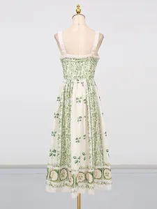 Back view of a forest-style floral print sling midi dress presented on a mannequin