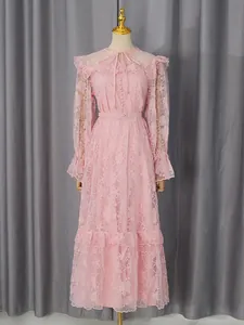 Elegant pink lace maxi dress featuring retro lantern sleeves and a matching waist belt