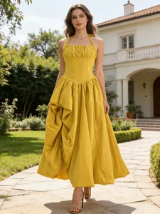 Elegant yellow halter neck maxi dress with pleated waist and retro design for women