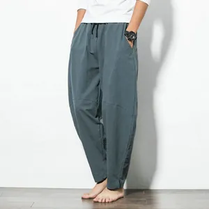 Loose men's Chinese style casual harem pants in dark teal with a minimalist design