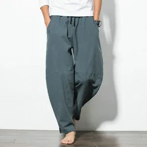 Men's loose harem pants in Chinese style featuring a wide-leg cut and drawstring waist