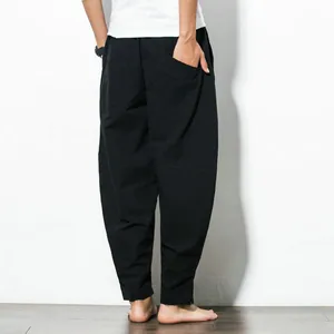 Detailed back view of loose black harem pants for men in a casual Chinese style
