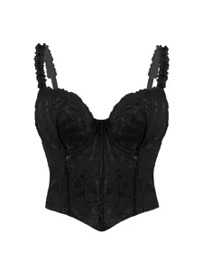 Vista dettagliata di un corsetto in pizzo nero con struttura retrò con ferretto