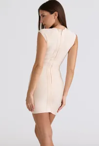 Close-up back view of an elegant beige ribbed bandage bodycon mini dress for women