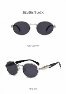 Gafas de sol ovaladas de metal con montura plateada y lentes grises