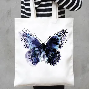 Artistic blue and purple butterfly print canvas tote bag for casual shopping and daily use