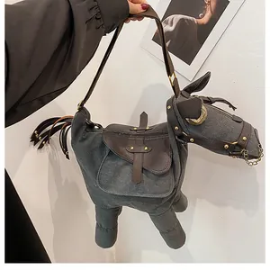 Detailed side view of a unique creative donkey-shaped canvas and leather crossbody bag