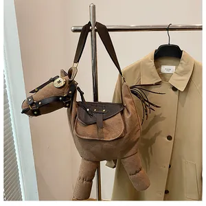 Whimsical donkey-shaped canvas crossbody bag featuring brown leather trim details