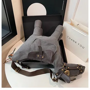 Close-up of quirky donkey-shaped canvas crossbody bag with faux leather details