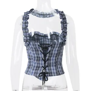 Detailed back view of a blue plaid denim corset top featuring ruffles and lace-up ties