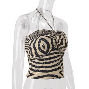 Detail showing sequined zebra pattern on a sexy ruched halter neck backless crop top
