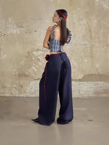 Stylish plaid corset top with ruffle straps and navy wide-leg trousers set for women