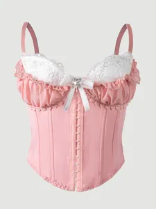 Detailed close-up view of pink and white lace corset camisole featuring fishbone structure