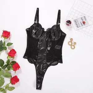Close-up of black faux leather and floral lace bodysuit with elegant thong design