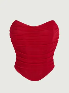 Close-up of red mesh ruched corset top with sexy sweetheart neckline and boning