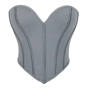 Dettaglio del corsetto grigio a cuore con rete traspirante e stecche di supporto