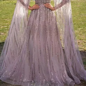 Close-up detail of shimmering sequins on a luxury purple mesh evening gown dress