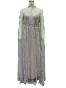 Close-up detail of mauve tulle evening gown with elegant silver sequin stripes