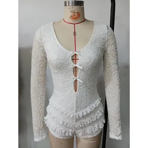 Close-up front view of elegant white lace long-sleeve bodysuit featuring hollow-out bow detail
