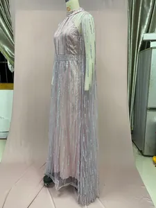 Elegant lavender mesh evening gown with vertical silver sequin stripes on mannequin.