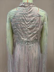 Back detail of pink mesh evening dress with silver glitter stripes and zipper.