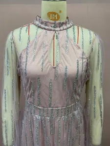 Detail of pink mesh evening gown with silver glitter stripes and keyhole neckline