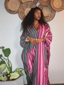 Detailed view of an African style plus size loose dress with vibrant color striped pattern