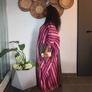 Loose-fitting African style maxi dress featuring vibrant magenta and green stripes