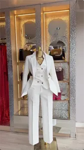 Elegant white 3-piece business suit set displayed on a luxury gold mannequin.