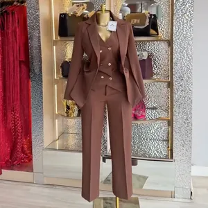Elegant brown women's 3-piece suit set featuring a blazer, vest and tailored trousers.