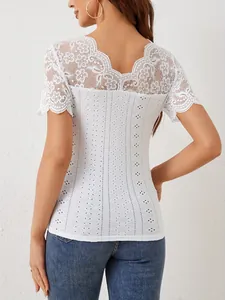 Detailed back view of a white lace splicing slim fit top with scalloped V-neckline