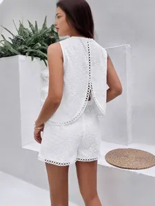 Elegant white eyelet embroidered backless sleeveless top and shorts set for summer