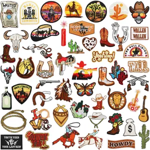 Detailed view of various Western cowboy themed embroidered iron-on patches for clothes