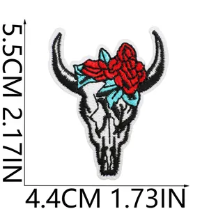 Close-up detail of bull skull embroidery patch with roses, sized 5.5cm by 4.4cm