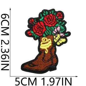 Embroidered brown cowboy boot patch with red roses and butterfly, size 6cm x 5cm