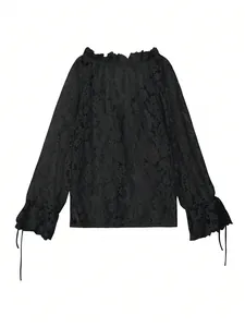 Detailed view of black floral lace blouse with hollow texture and elegant ruffled cuffs