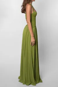 Side view of olive green halter neck maxi dress with lace bodice and pleated skirt