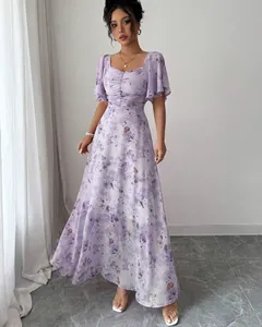 Elegant purple floral maxi dress featuring flutter sleeves and a slim fit bohemian design