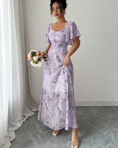 Elegant lavender floral maxi dress featuring flutter sleeves and a sweetheart neckline