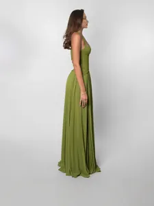 Elegant green halter backless pleated maxi dress featuring a lace bodice side view