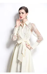 Elegant cream long dress featuring a Polo collar, floral lace mesh sleeves, and a bow belt