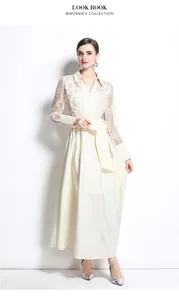 Elegant full length cream polo collar dress featuring mesh embroidery and textured skirt