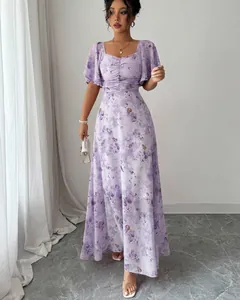 Elegant purple floral maxi dress featuring butterfly sleeves and a ruched bodice design