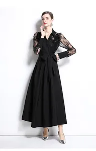Elegant black maxi dress featuring intricate lace sleeves and a classic polo collar