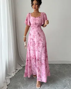 Elegant pink floral maxi dress with flutter sleeves and flattering square neckline