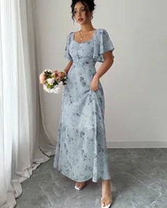 Elegant light blue floral print maxi dress with ruffle sleeves and slim fit design