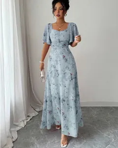Full length view of light blue butterfly print maxi dress with flutter sleeves