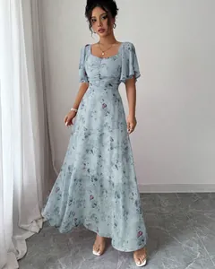 Elegant light blue maxi dress with butterfly print and ruffle sleeves for summer season